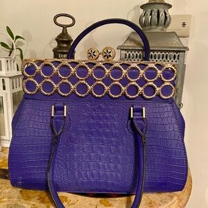 Elegant Purple Handbag with Gold Accents 15 inches wide by 13 inches high. NICE.